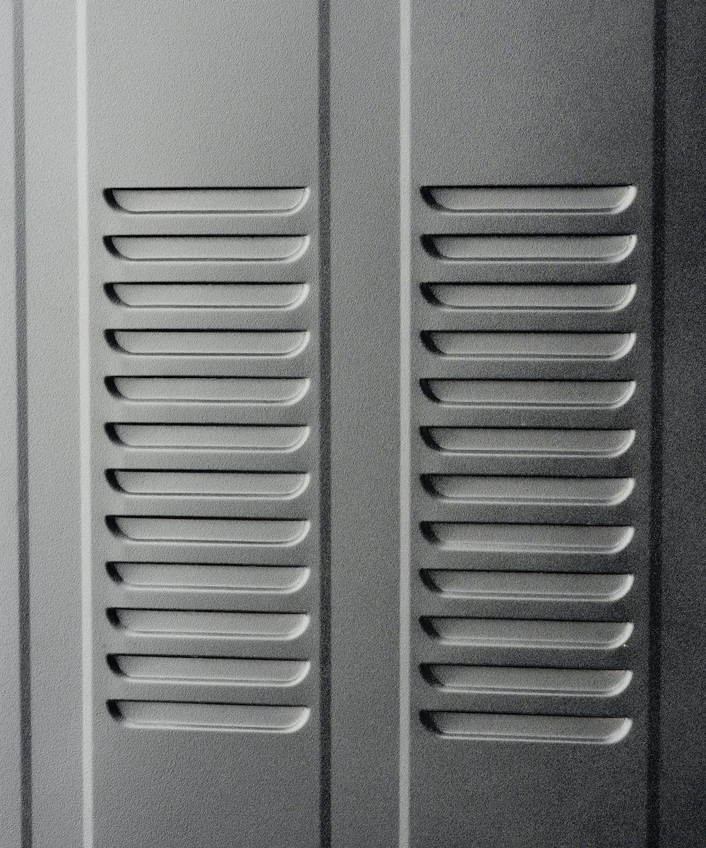 Metal ventilation grille in a refridgerator close up photo